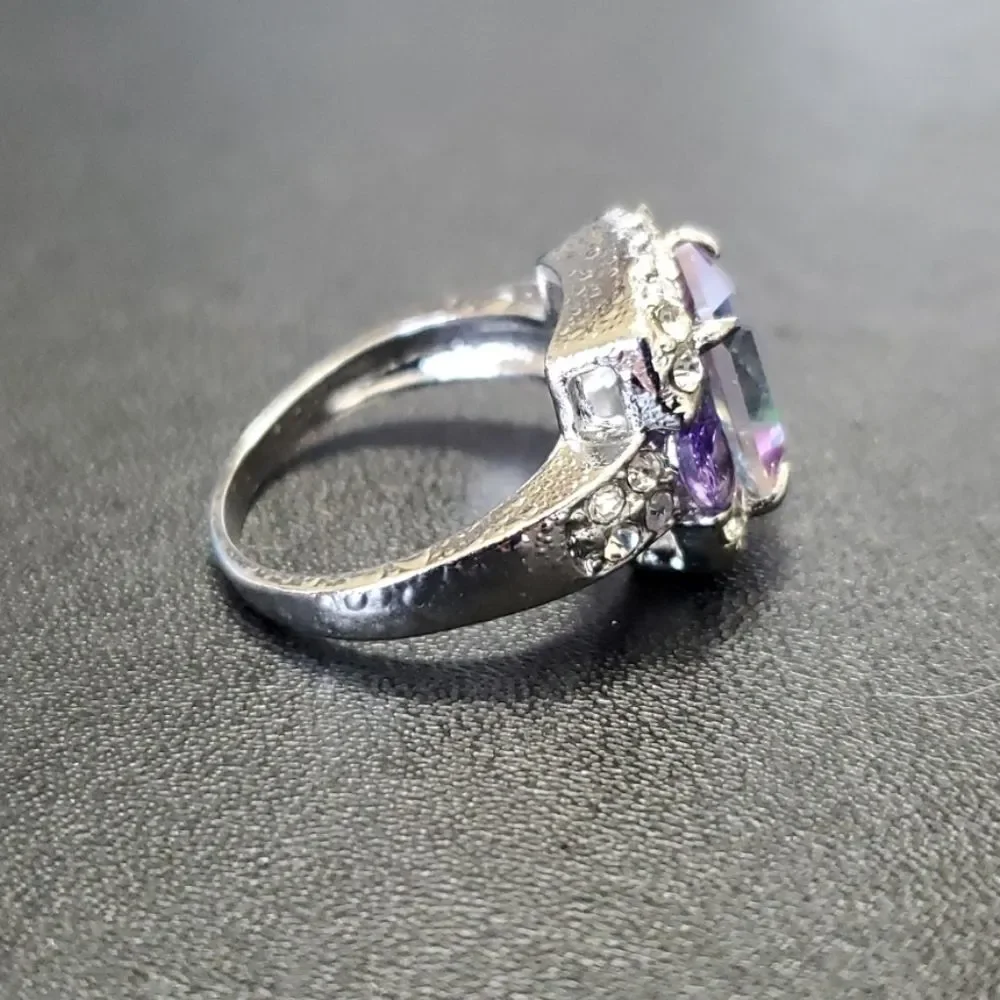 Silver tone rainbow rhinestone ring